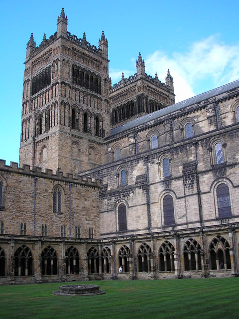 Photo of Durham Cathedral western tower and cloisters with blue sky