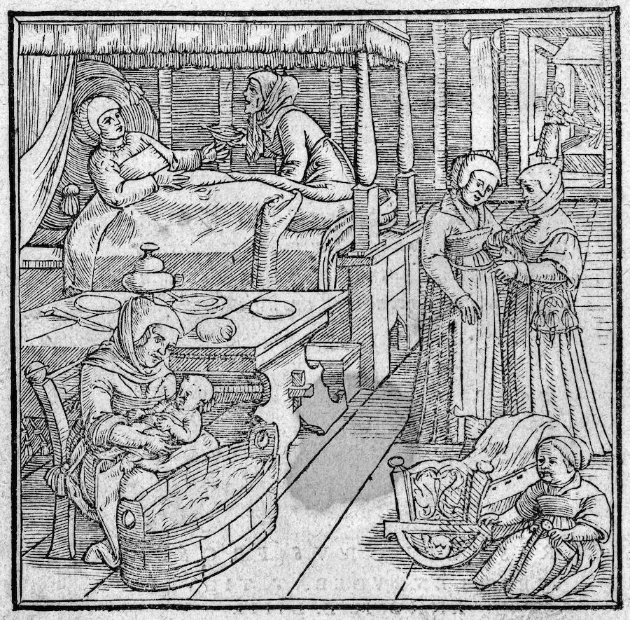 A woodcut scene of a birthing chamber with a recovering woman in bed being tended by a midwife in the background. In the foreground, two other women talk, another sits by the empty cradle while another bathes the newborn baby