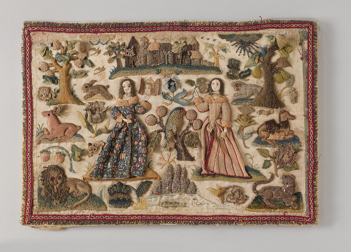 An embroidery of two woman with a landscape and castle in the background