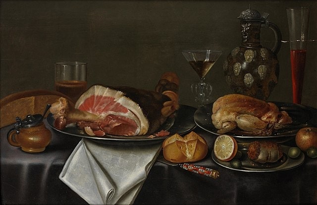 Alexander Adriaenssen, Still life with a ham and chicken on silver plates, glasses of wine and beer, a bread roll, a peeled lemon and an earthenware jug on a table draped with a grey cloth (1624-1661)..